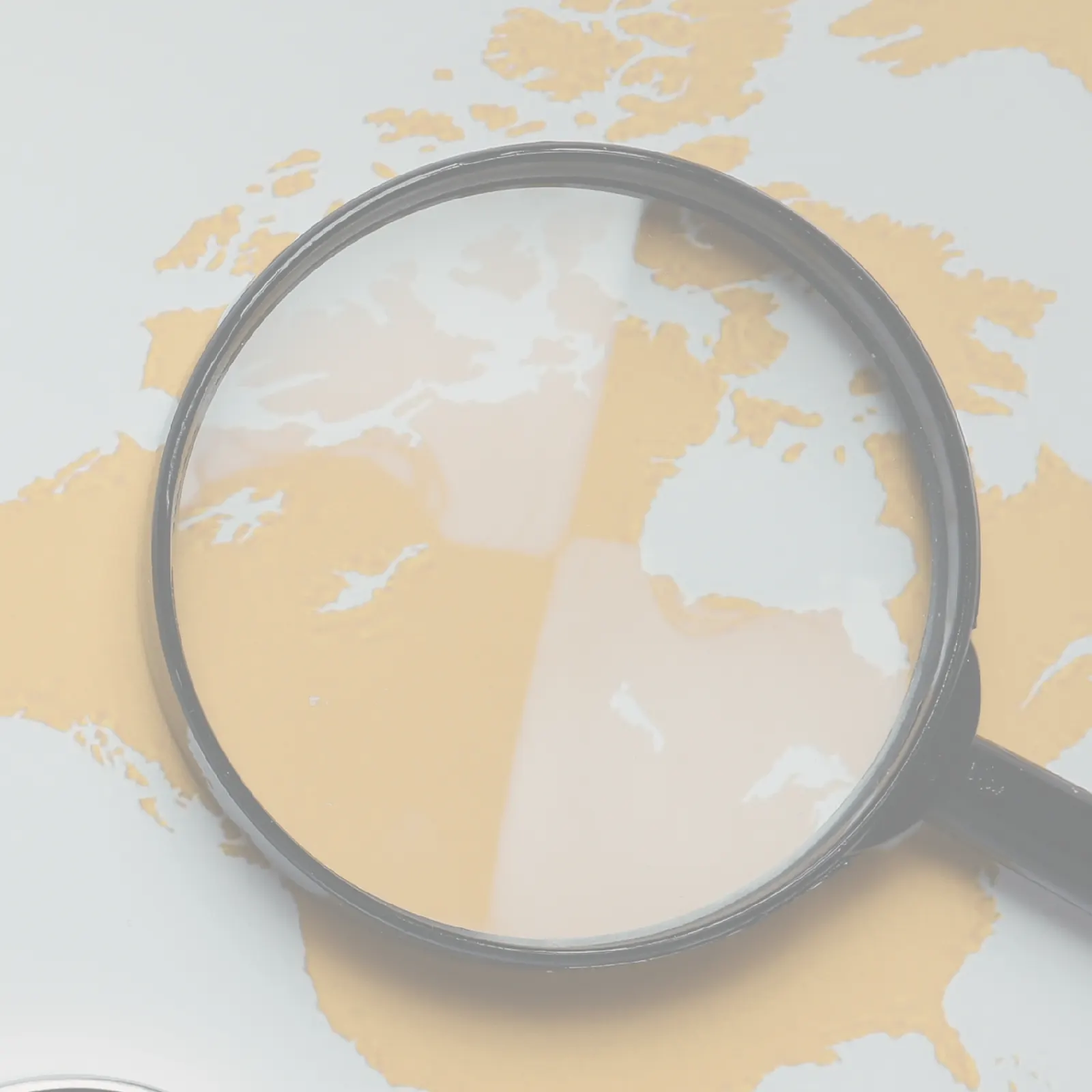 Loupe sur une carte du monde — la mise en conscience